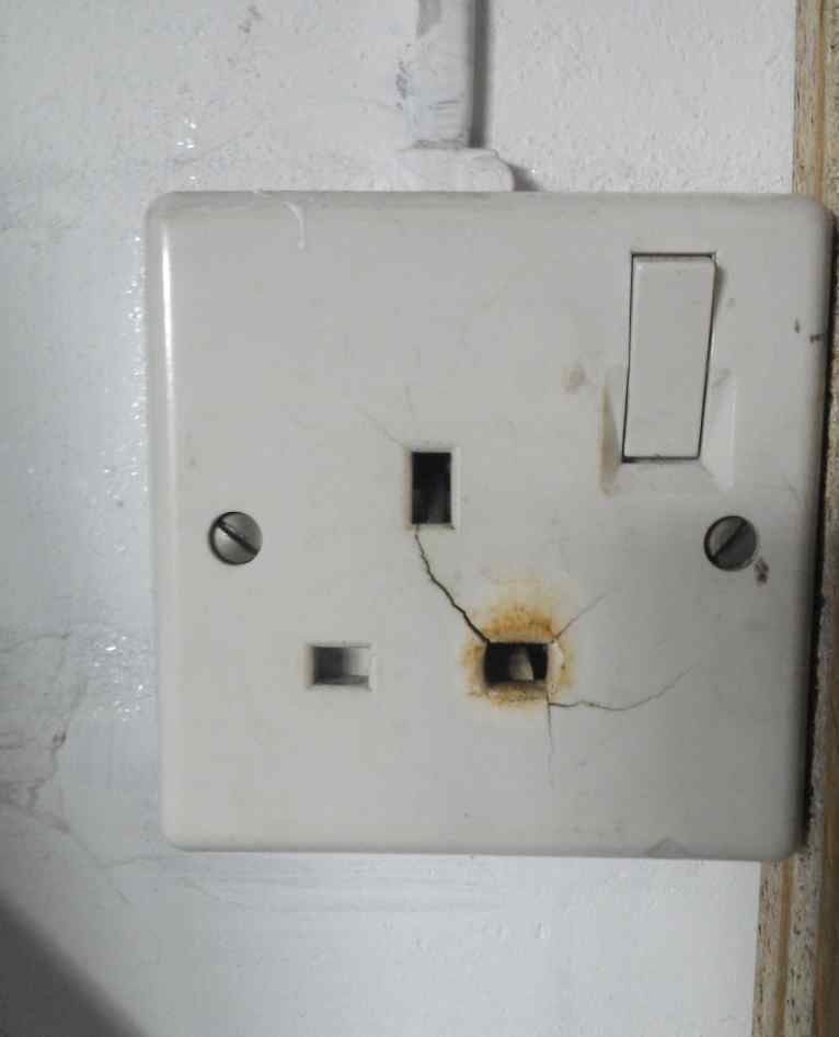 cracked electrical socket